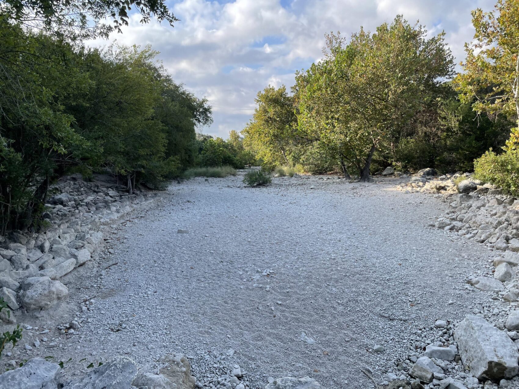 A view of the rocky, dry river bed of Barton Creek in Austin, Texas
